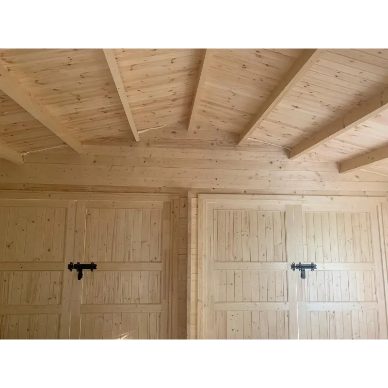 Doppelgarage aus Holz 6x6, 44mm, Innenansicht Tore – realisierte Ausführung